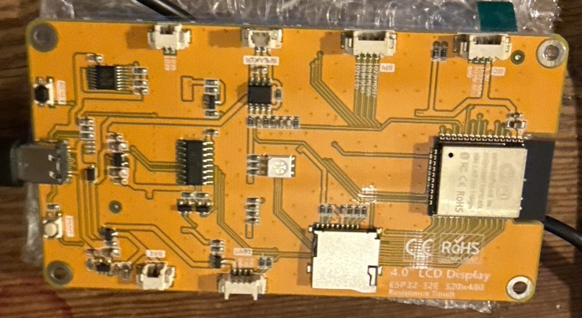 The back of the ESP32-32E board: the ESP32 module, a microSD slot, a USB-C socket and small connectors including one for a speaker